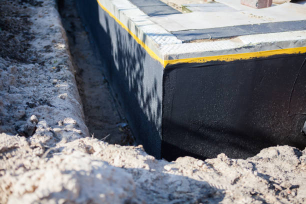 Professional Waterproofing technician working in Saukville, WI